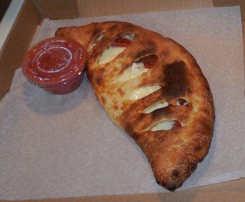 Calzone was just about 12" and very tasty, in spite of those unusual dough cuts...