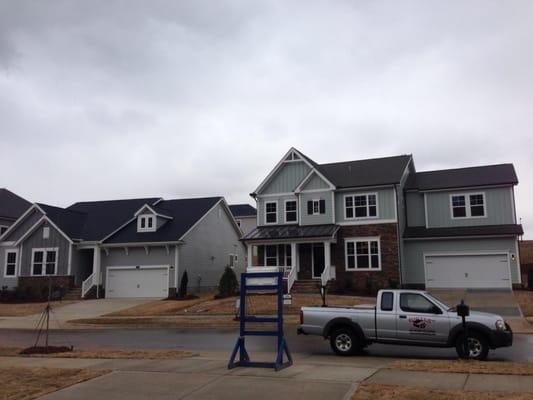 Here's a picture of a couple of houses that we painted for David Weekley homes on a neighborhood in Holly Springs NC.