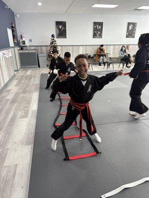 Our Kids class has a great time working on their fitness.