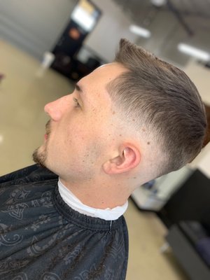 Gentlemens cut with a mid drop fade and corners lined up