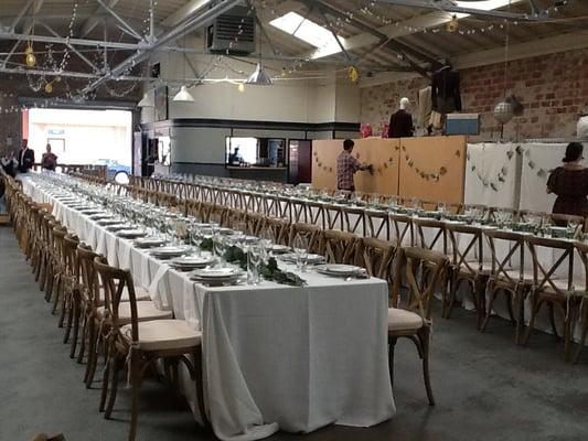 Family style long tables and bentwood chairs...