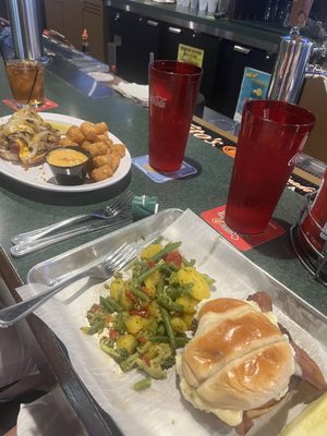 Jalapeño cream cheese burger with vegetable medley and new prime rib hotdog with tots and beer cheese dip. Flavors 10/10!!