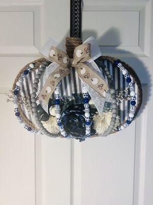 Beaded pumpkin wreath. This one is done in blue. They also come in black n white or orange.$35