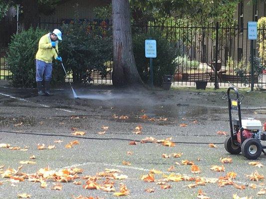 Pressure washing parking lot