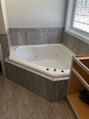 Custom tub surround and bathroom floor install