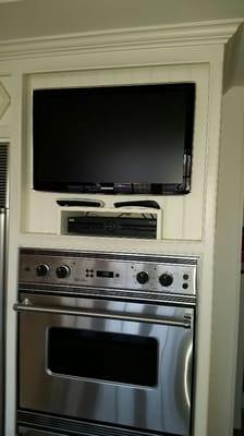 Kitchen Television above oven.