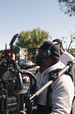 On set for a music video in LA. Gear pictured: Movi Pro, RED Epic W, Ready rig vest & headsets (which are great when on set).