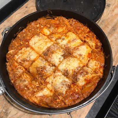 Our Cast Iron Lasagna served with home made garlic cheese rolls.