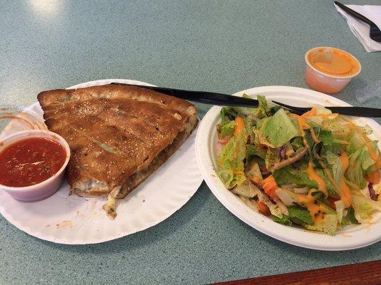 Stuffed cheesesteak pizza and house salad