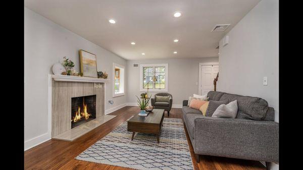 Living Room Renovation with Custom Modern Fireplace Mantle