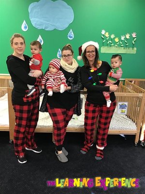 We have the cutest babies & staff!  Infant teachers in their matching holiday jammies for a spirit day!