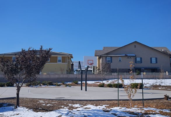 basketballs near parking lot. never busy