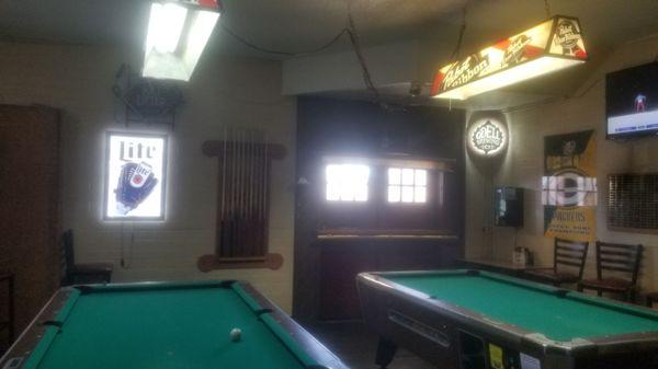 Pool shooting area. A real bar.