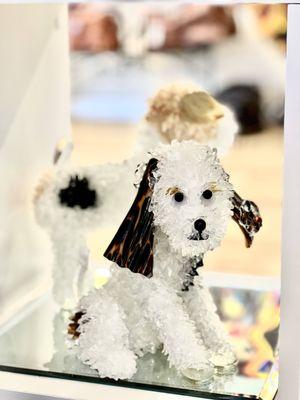 Glass Sculptures of dogs and kittens brighten up any room, here at the Deprise Brescia Art Gallery.