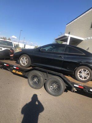 Car on flat bed