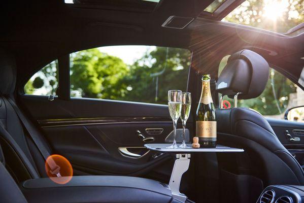 Every Penn Limo trip includes complimentary amenities: Fiji or sparkling water, mints, Lindt chocolate, and custom options upon request.