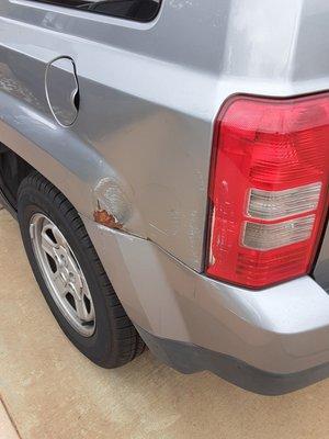 Damage to my Jeep - busted tail light & rusted & peeling paint