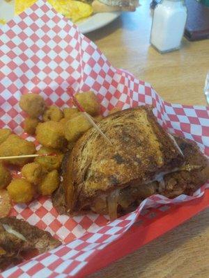 Patty melt, cheap meat, over cooked and dry