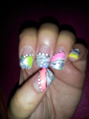 5bright neon colors with zebra pattern rhinestone n glitter to polish it up :-) love it!