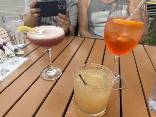 peach margarita, hub city sour, and aperol spritz