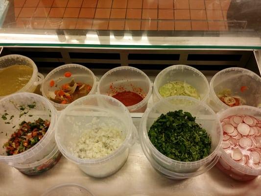 Salsa bar!  Fresh cilantro, onions, radishes (yes!), pico de gallo, and house red and green sauces.