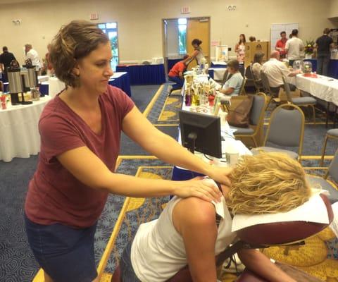 Sharon helps out at the Health Fair with a relaxing massage.