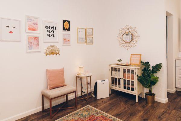 Waiting area with air purifier.