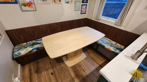 Built-in wrap around dining booth and custom table