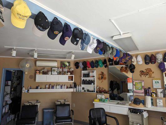 The impressive hat collection that he has going on inside!