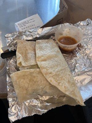 Sad, comically wrapped cold burrito with the tiniest portions I've ever seen at a Chipotle. This store needs a management overhaul.