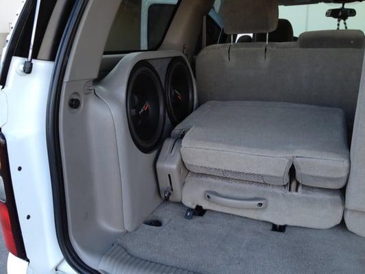 Subwoofer enclosure built by our CustomShop.  Seat is fully functional, and subs are covered by a custom grill.