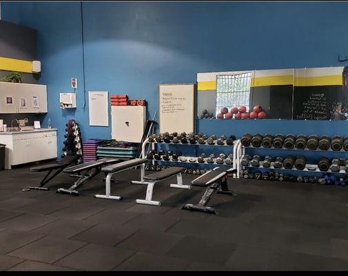 Lots of free weights benches and space.