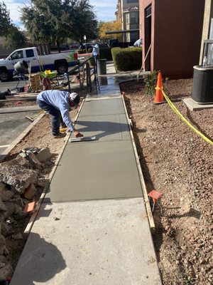 Replace sidewalk finish work