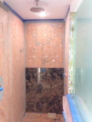 New custom shower stall being installed for a residential customer. Jordan & Sons does tile work also.