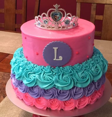 Tiered princess frozen themed cake we made