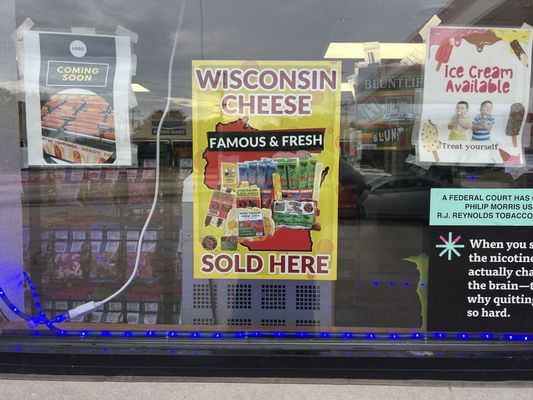 Wisconsin cheese  Ice cream  Tornadoes coming soon signs on the window