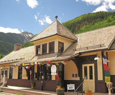 Our home is a turn-of-the-century train depot, a beautiful building listed on the National Register of Historic Places, located