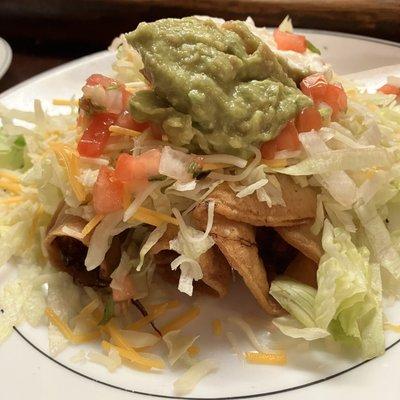 Happy hour chicken taquitos