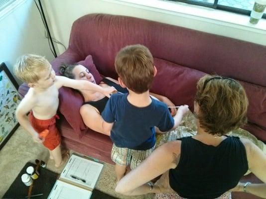 Rowen overseeing the big brothers check up on baby at a prenatal visit.