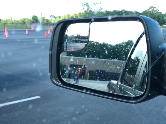 Drivers side view mirror and glass filthy.