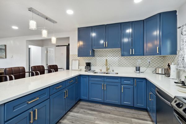 Fully stocked kitchen with plenty of counter space for your cooking needs.