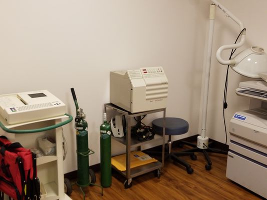 Exam room with new EKG machine, Autoclave/Sterilizer