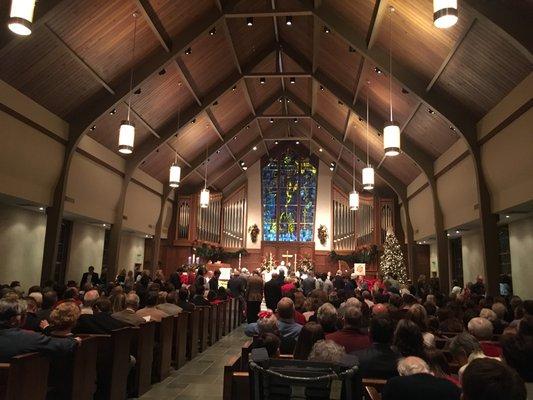 Our renovated Sanctuary with the Great Commission window and the pipes of our Buzard organ, installed in 2010.