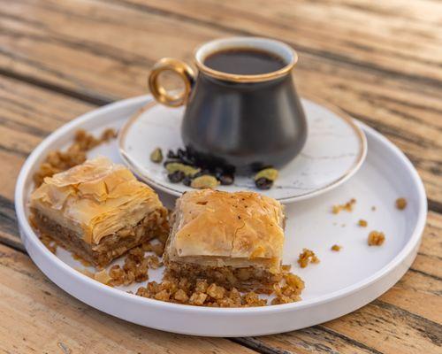 Served in 2's. This sweet treat is a layered pastry, made with filo dough, filled with chopped walnuts, and topped with our handmade syrup,