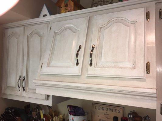 Instead of replacing my kitchen cabinet's I chalk painted them with shadow paint and wax mix of 15% Jacobean/ 85% clear wax.