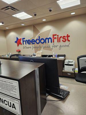 The teller counter inside the Freedom First Credit Union at Towers.