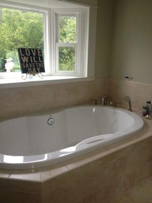 Wonderful master bath with champagne tub