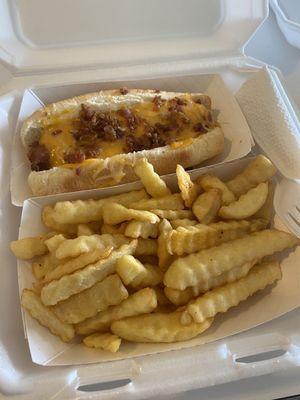 Bacon cheddar dog with seasoned crinkle fries