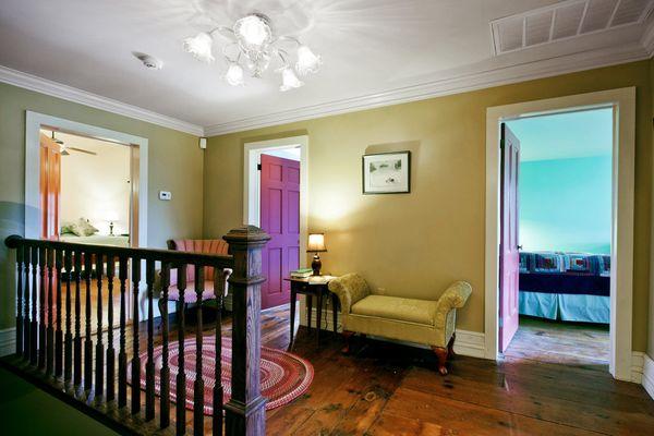 Second floor landing to 4 bedrooms and 3 1/2 bathrooms in Victorian motif.