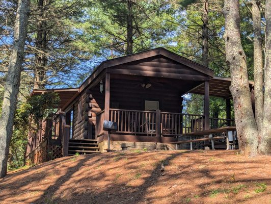 Cabin 1, is a one bedroom with a loft.  Sofa is also a sleeper.  Has a beautiful deck to enjoy your coffee and listen to the river nearby.